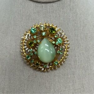 VTG Made in Austria brushed Gold Tone Green Cabochon Rhinestone Enamel Brooch